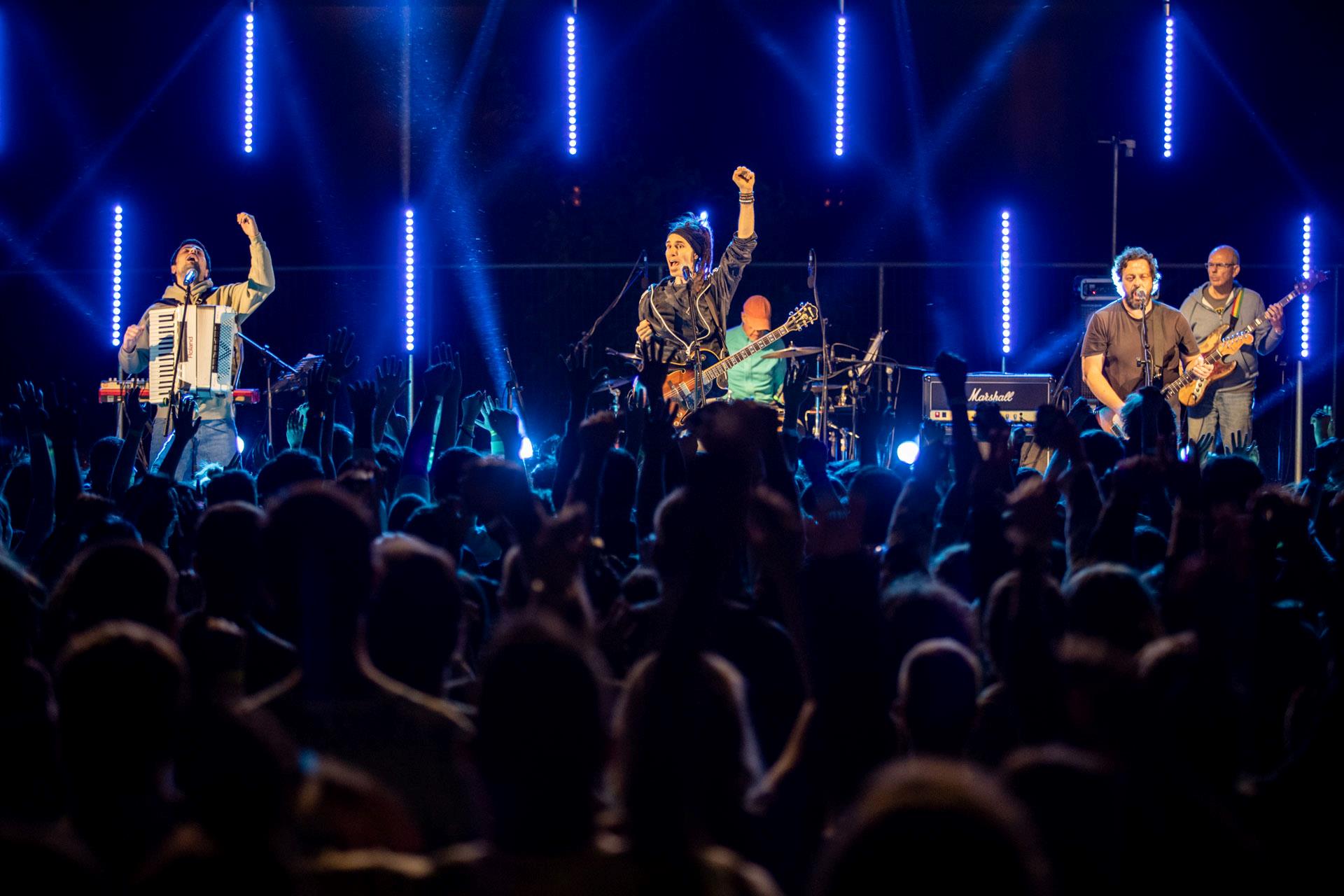 A band playing music on stage.