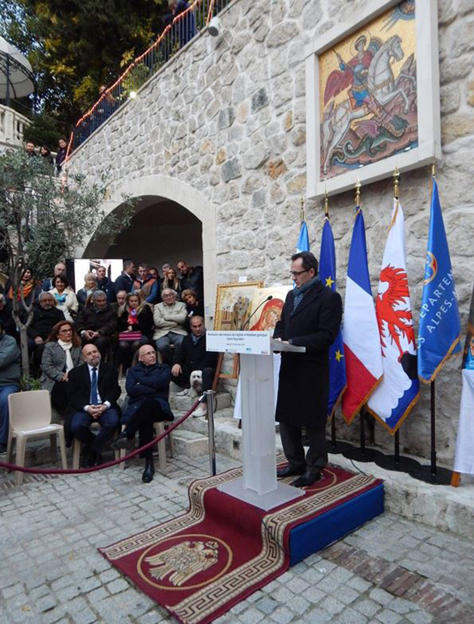 A member of the Stavros Niarchos Foundation gives a speech at the Saint Spyridon Greek Orthodox Church of Nice