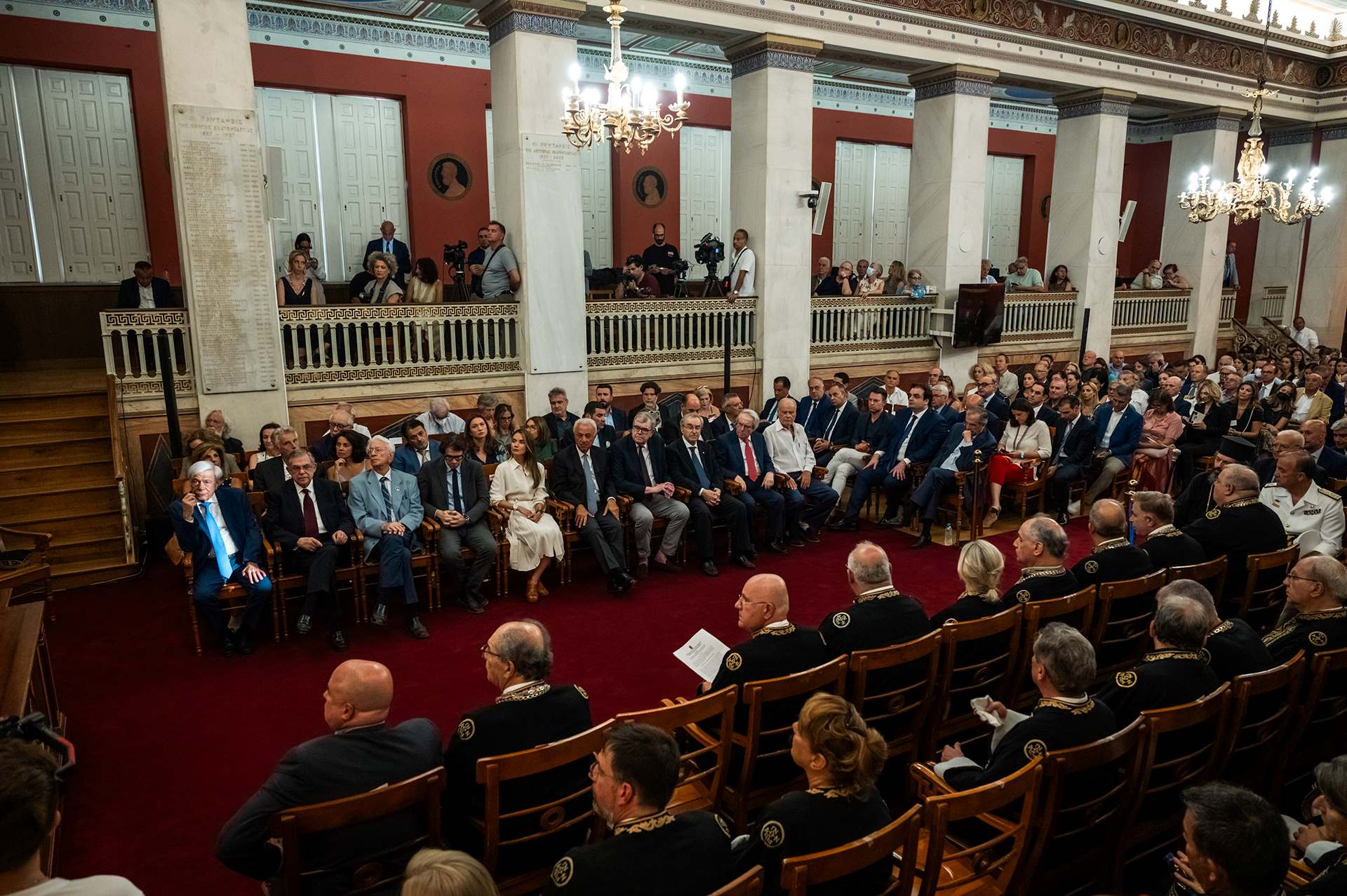 Photo of the audience, seated in their seats in the magnificent Great Hall of the NKUA, during the ceremony.