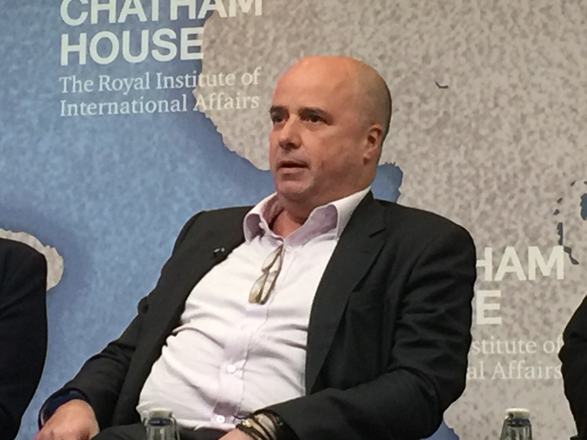 Andreas Dracopoulos, co-president of the Stavros Niarchos Foundation, sits on stage at Chatham House