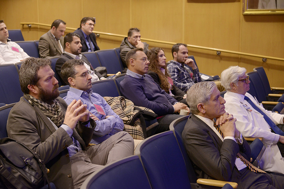 The audience attentively watch the presentations at the training