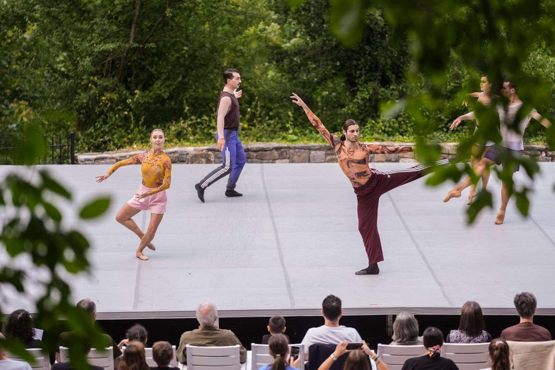 Ballet dancers dancing on stage.