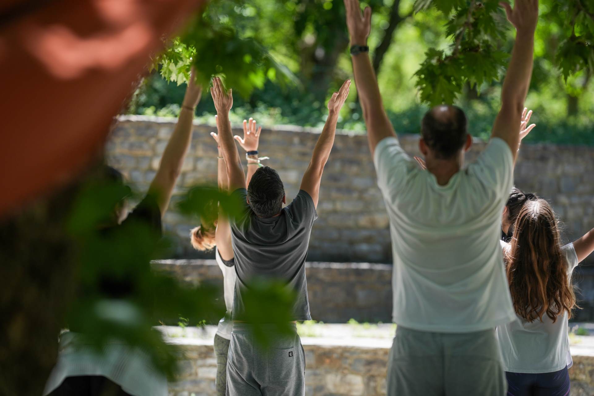 People doing a yoga class.
