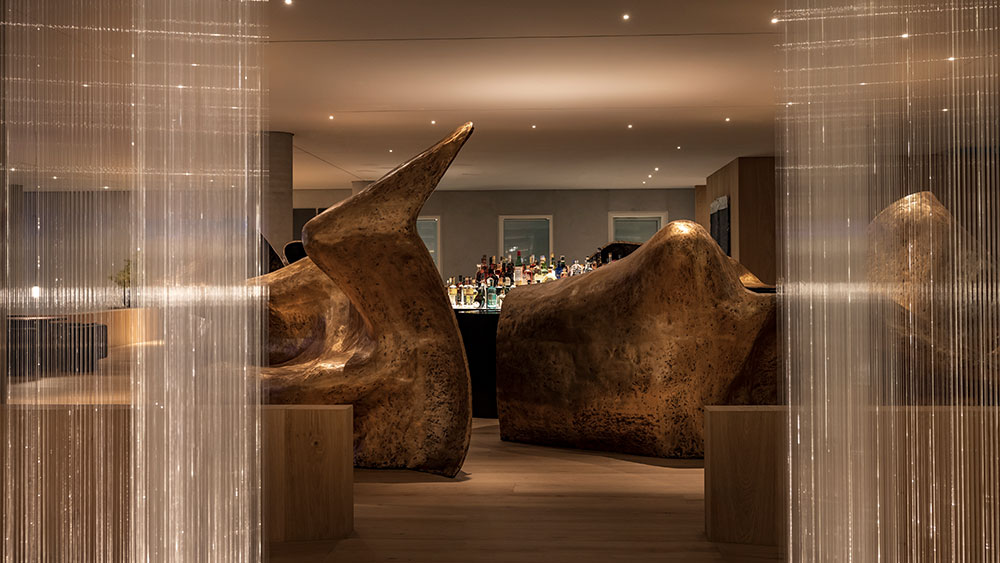 Golden, massive works of art decorate the restaurant interior
