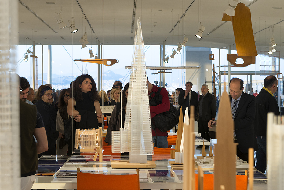 Close-up photo of a table showing a large model of a tall building