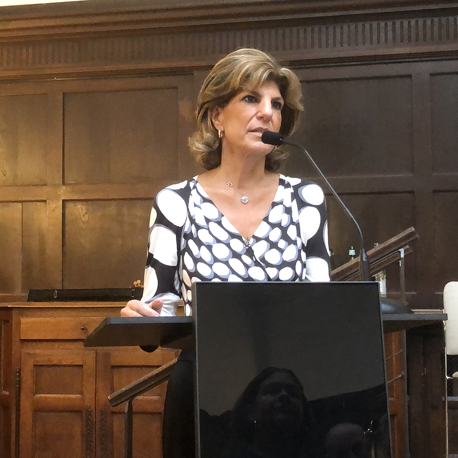 A woman gives a speech at the new Institute for Ideas and Imagination in Paris