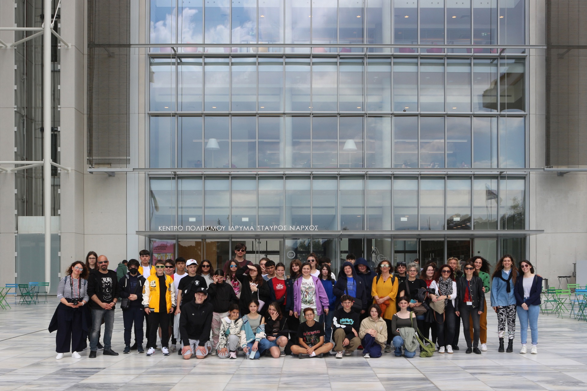 Students standing outside the main entrance of the SNFCC