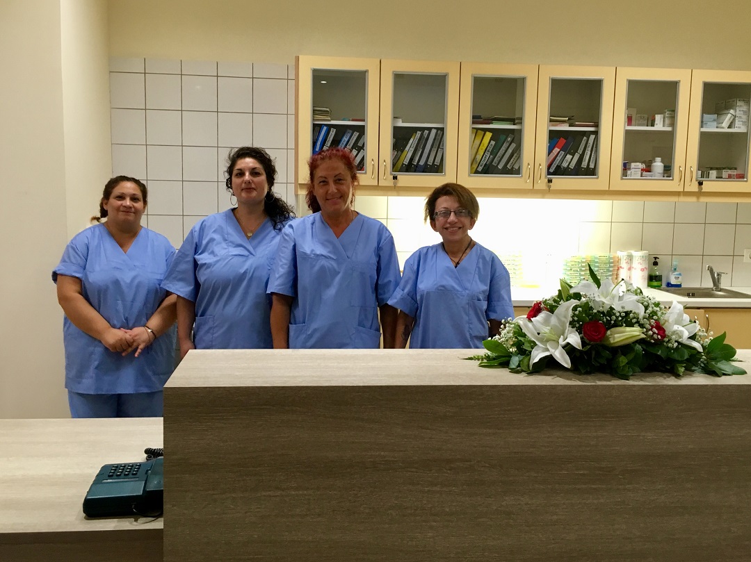 Four women in scrubs at the Elderly Care Unit of Lixouri in Kefalonia